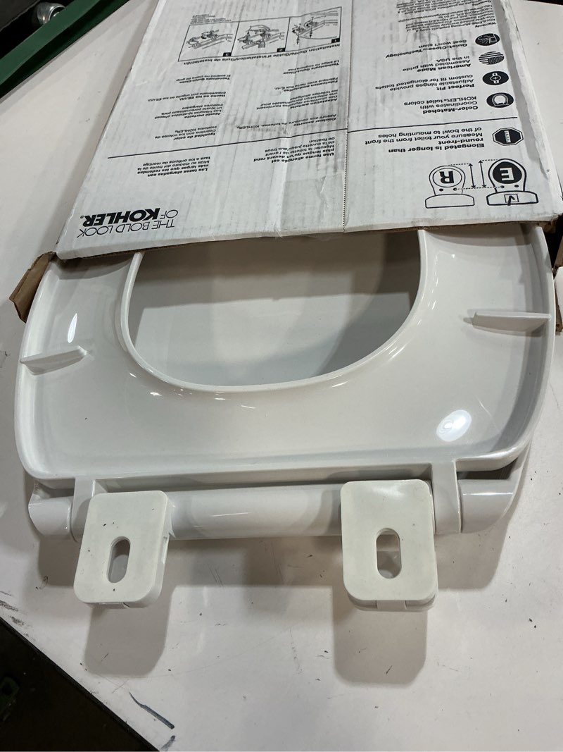 Condition photo showing As Is for KOHLER Stonewood Quiet-Close, Elongated Toilet Seat Soft Close, Durable Wood, Easy Installation, Universal Fit, Home Essentials, White Finish, K-20466-0 Elongated White