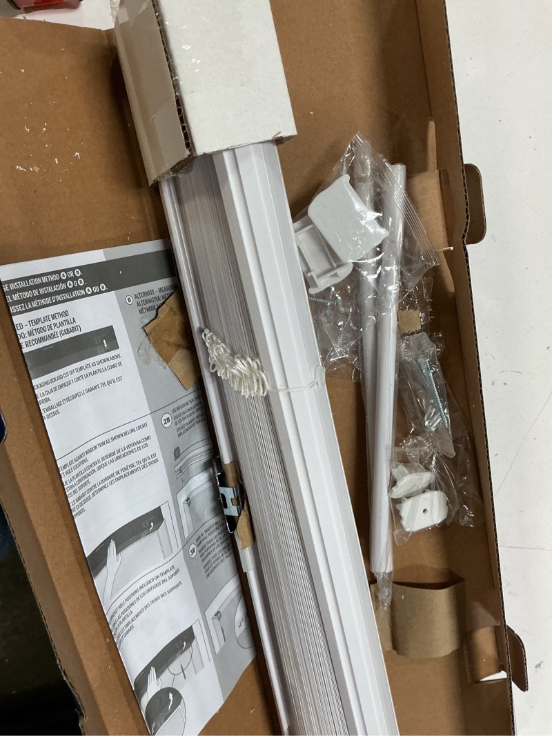 Condition photo showing As Is for levolor trim+go 1-in slat width 23-in x 64-in cordless white vinyl room darkening mini-blinds