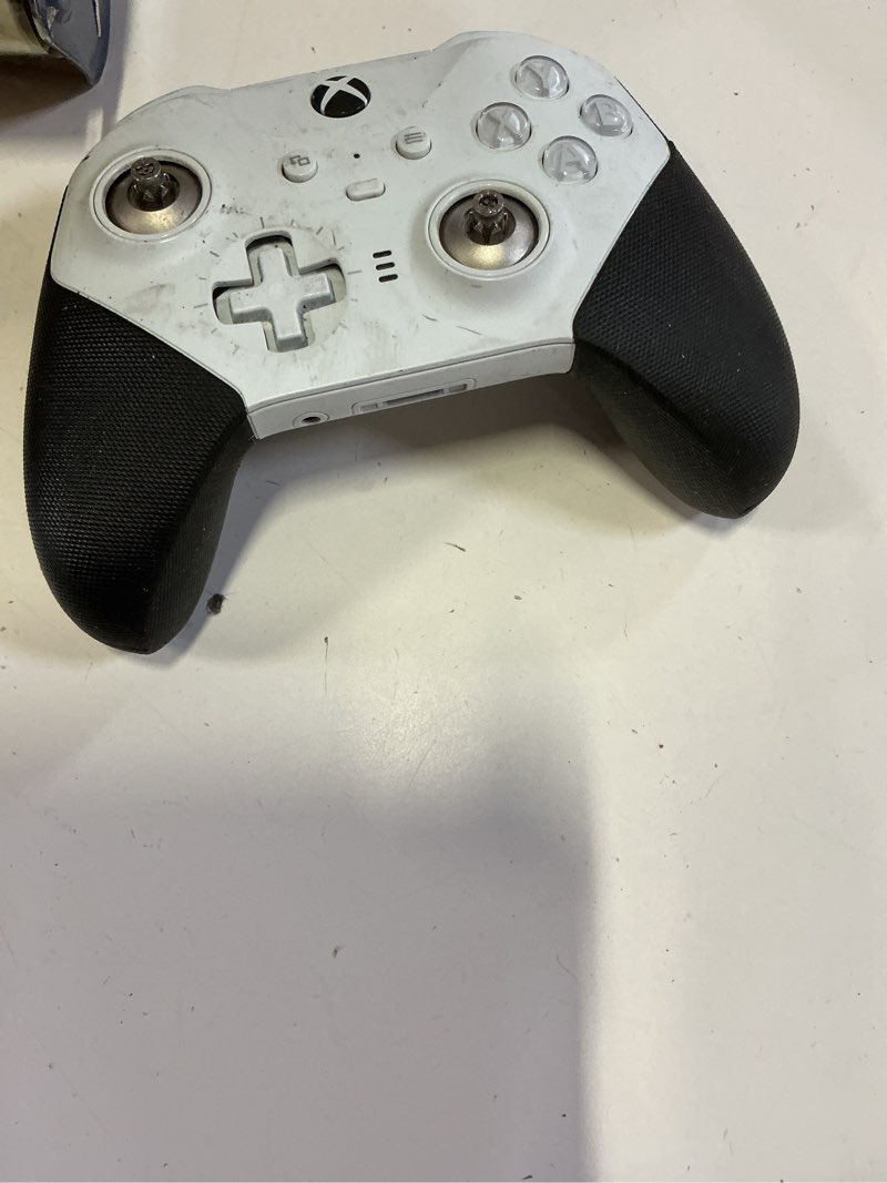 Condition photo showing As Is for (defective)xbox elite series 2 core wireless gaming controller – white series x|s, one, windows pc, android, and ios