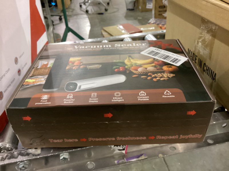 Condition photo showing New/Like New for Vacuum Sealer,Food Saver Vacuum Sealer Machine,Ultimate Suction Power,Compact Design,Cordless Handheld Vacuum Sealer (Contains 30 Reusable Seal Bags) Vacuum Sealer + 30 Bags