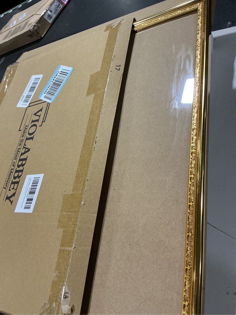 Condition photo showing Good Condition for violabbey 11x17 gold picture frame, display 9x15 photo with mat or 11x17 without mat, ornate vintage 11 x 17 gold frame for wall decor or tabletop display gold 11x17