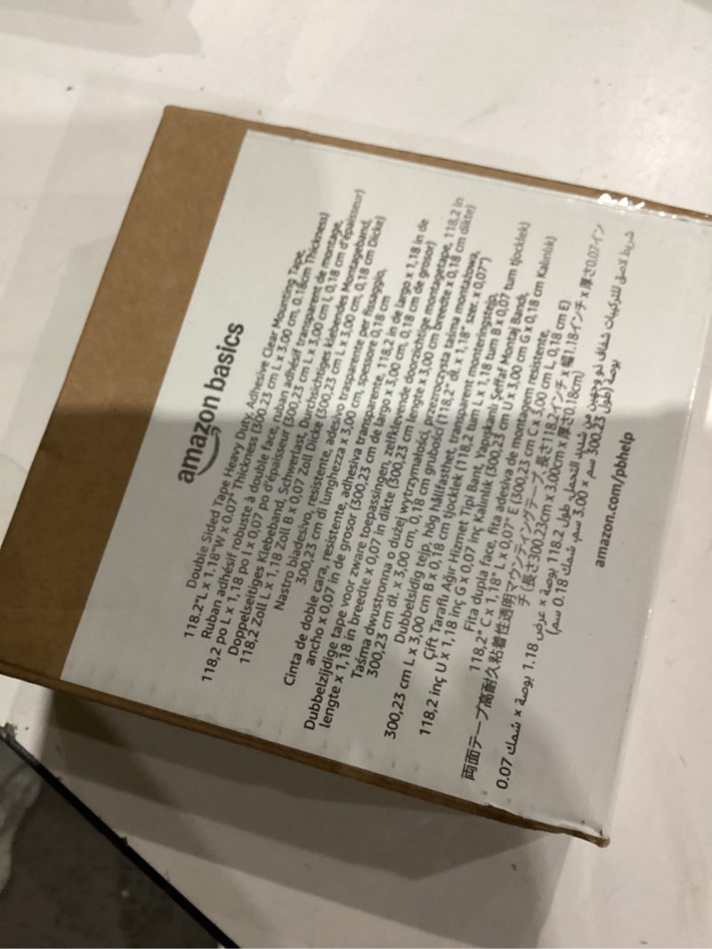 Condition photo showing As Is for Amazon Basics Double Sided Tape Heavy Duty, Adhesive Clear Mounting Tape, Transparent, 118.2" L x 1.18" W x 0.07" H