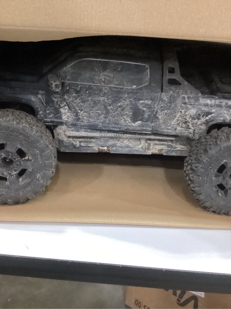 Condition photo showing As Is for arrma rc truck 1/10 big rock 4x4 223s blx brushless street truck rtr (batteries and charger not included) with dsc, (black), ara4312v4t1