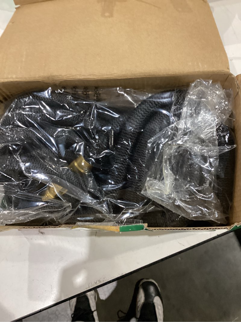 Condition photo showing As Is for flexi hose lightweight expandable garden hose, 50ft - retractable garden hose, water hose - no-kink flexibility, 3/4 inch solid brass fittings and double latex core black 50 ft