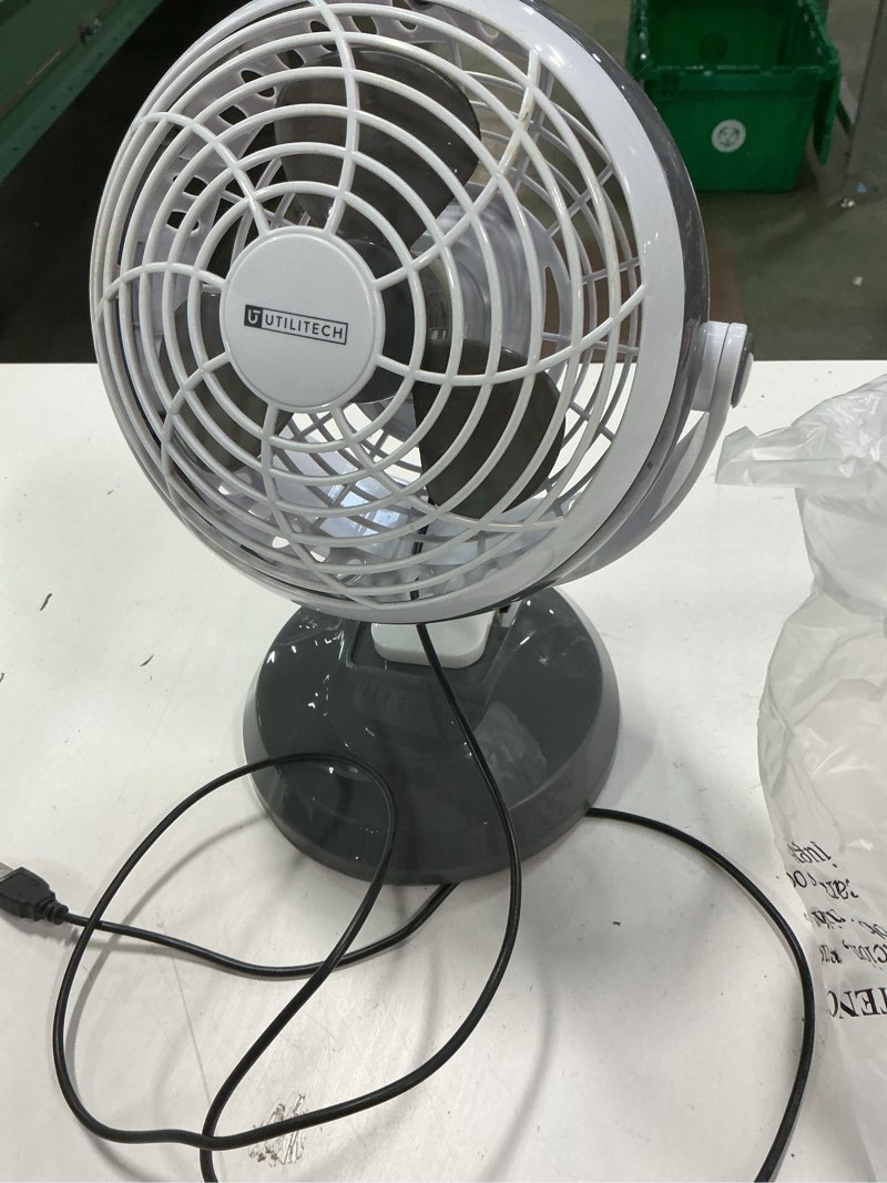 Condition photo showing As Is for Utilitech 6 in diameter desk clip fan