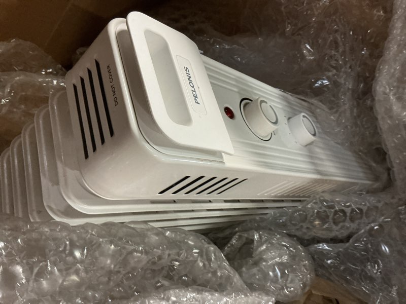 Condition photo showing As Is for Pelonis Oil Filled Radiator Heater for Large Space, 2025 Upgraded, Space Heaters with 1500W Quiet Warmth Radiant Heater, 3 Heating Modes, Overheat & Tip-Over Protection, Adjustable Thermostat, White Upgraded White