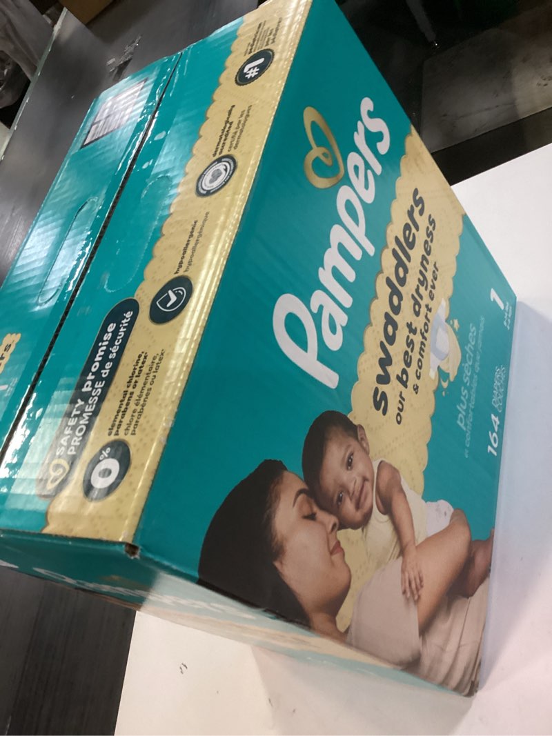 Condition photo showing New/Like New for pampers swaddlers diapers, size 1 (8-14 lbs), 164 count, absorbent, keeps baby dry and comfortable, skin safe disposable baby diaper size 1 164