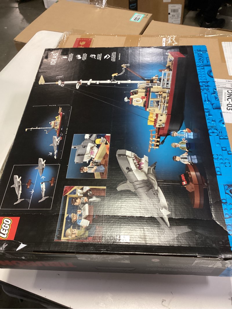 Condition photo showing New/Like New for LEGO Ideas Jaws Set - Diorama Kit for Fans of The Classic Movie - Shark Toy - Movie Memorabilia Gift for Adults - Includes Orca Boat and Chief Brody, Hooper and Quint Minifigures - 21350