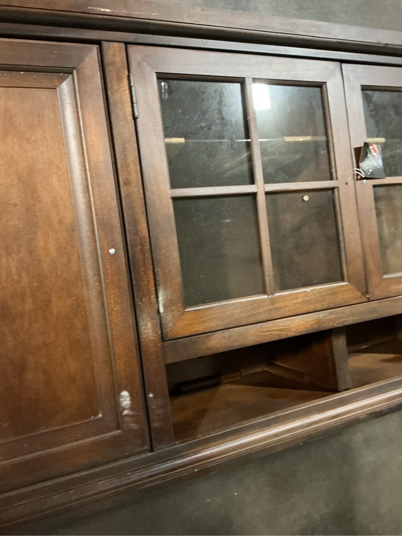 Condition photo showing As Is for missing handles on cabinet doors rosanella 82in media console / tv stand