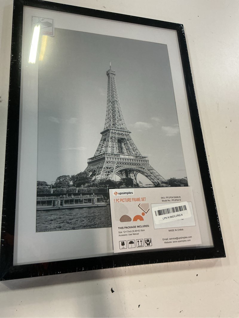 Condition photo showing Good Condition for upsimples 12x17 picture frame, display pictures 10x14 with mat or 12x17 without, wall hanging photo frame, black, 1 pack black 12x17