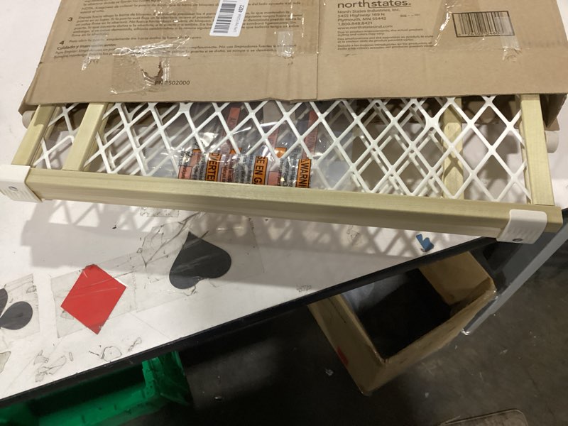 Condition photo showing Good Condition for Toddleroo by North States - Diamond Mesh Wooden Baby Gate: Pressure Mounted Baby Gate for Doorways - Adjustable 26.5 to 42 Inches Wide - 23 Inches Tall