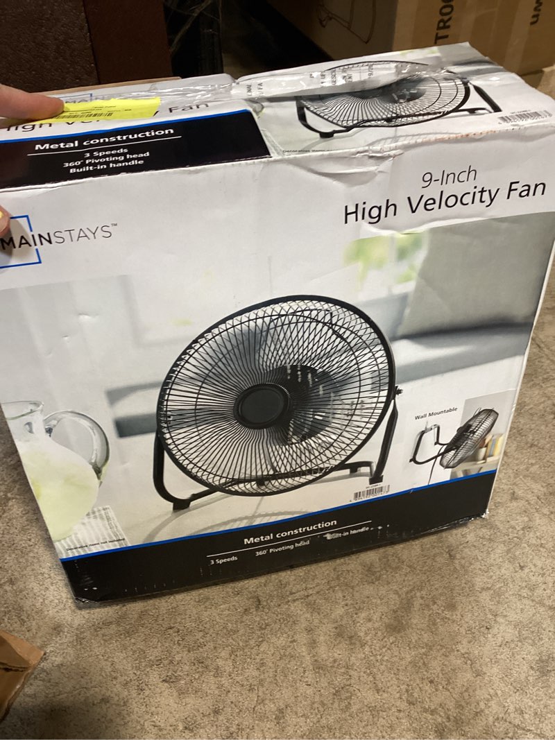 Condition photo showing As Is for mainstays 9 in high velocity floor fan wall mount black