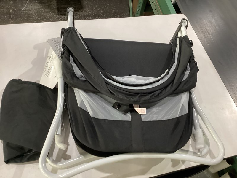 Condition photo showing New/Like New for dream on me karley bassinet in black, lightweight portable baby bassinet, quick fold and easy to carry, adjustable double canopy, indoor and outdoor bassinet with large storage basket.