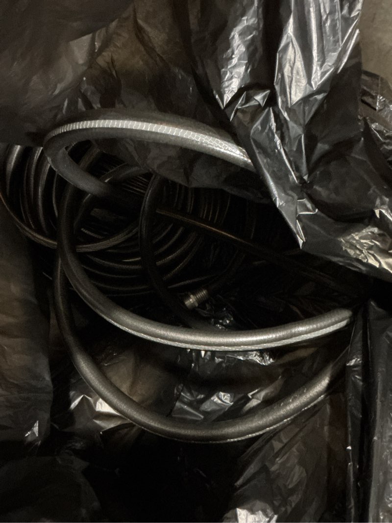 Condition photo showing As Is for neverkink teknor apex 5/8-in x 60-ft heavy-duty kink free vinyl gray coiled hose