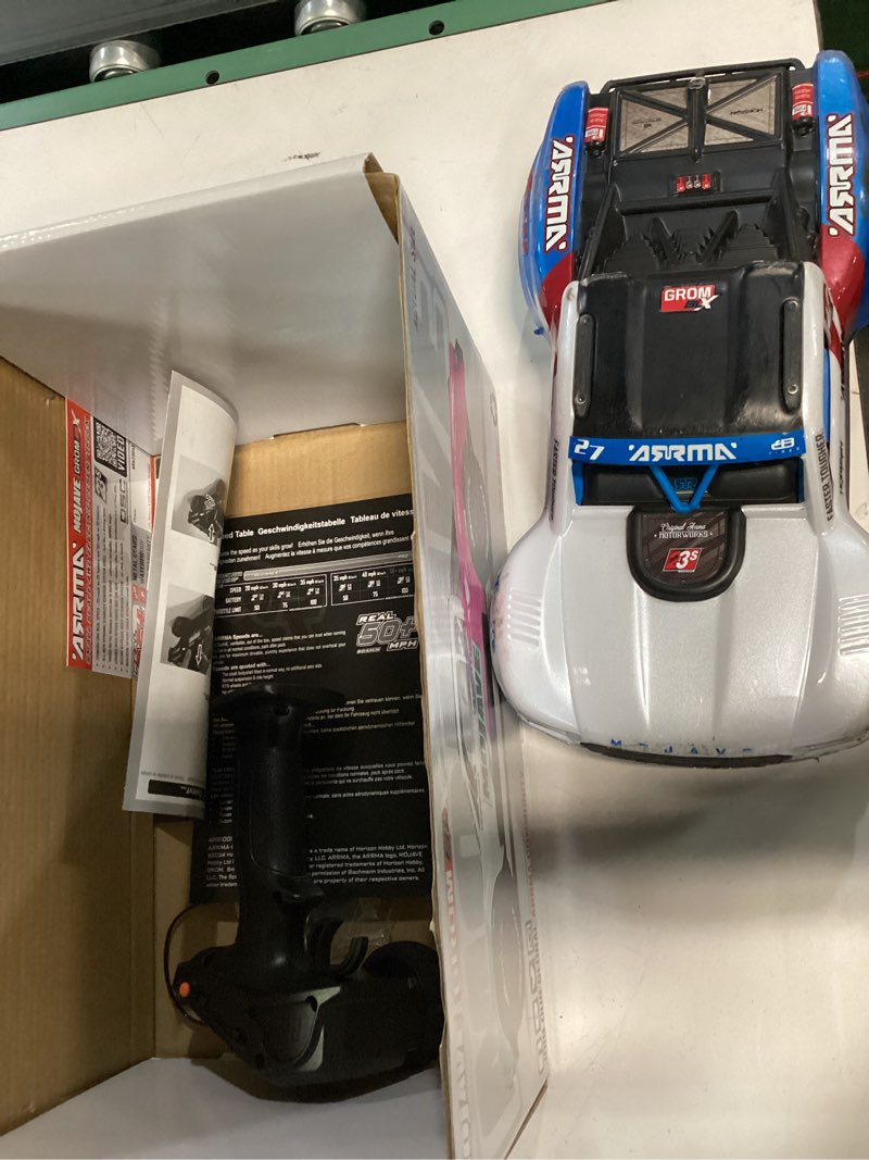 Condition photo showing As Is for ARRMA RC Truck Mojave GROM 4X4 223S BLX BRUSHLESS Small Scale Desert Truck RTR with DSC, Battery & Charger Included, White, ARA2304ST2
