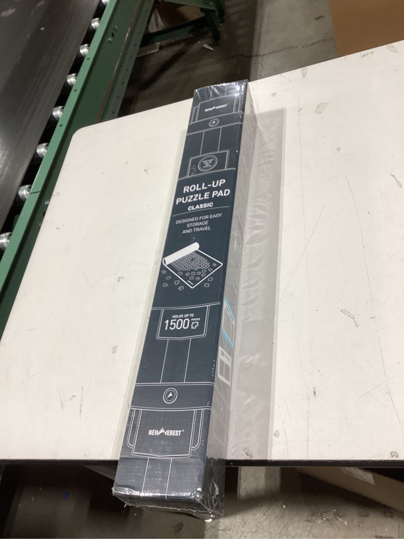 Condition photo showing New/Like New for The Original Newverest Jigsaw Puzzle Mat Roll Up, Saver Pad 46” x 26” Portable Keeper Up to 1500 Pieces with Non-Slip Rubber Bottom & Smooth Top + 3 Puzzle Sorting Trays & Travel-Friendly Storage Bag 1500pcs