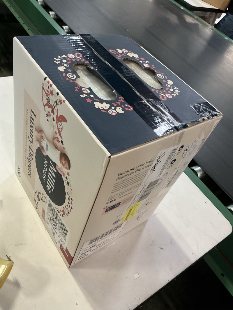 Condition photo showing New/Like New for millie moon luxury diapers - size 1 (6-11lbs), 100 count, cloudtouch ultra soft diapers, up to 12hr absorbency, double leak guard and wetness indicator