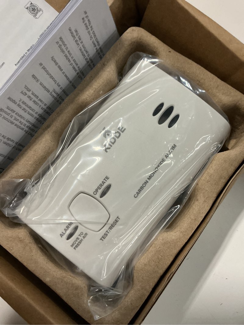 Condition photo showing New/Like New for Kidde Carbon Monoxide Detector, Battery Powered CO Alarm with LEDs, Test-Reset Button, Low Battery Indicator, Portable
