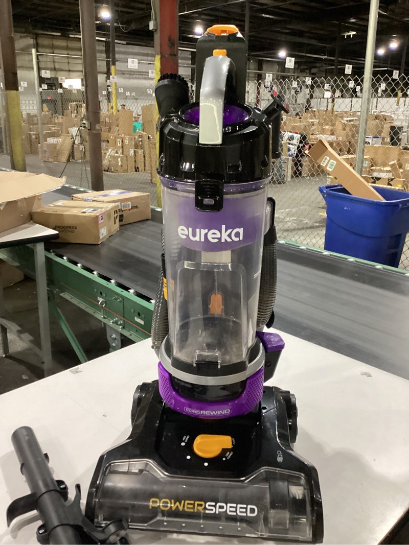 Condition photo showing As Is for NOT TESTED Eureka Powerful Lightweight Upright Vacuum Carpet and Floor, PowerSpeed NEU202 with Automatic Cord Rewind, Purple PowerSpeed NEU202 with Automatic Cord Rewind Purple