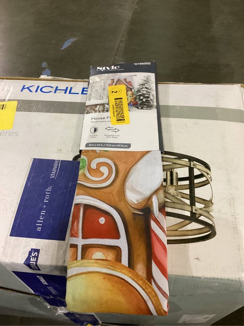 brand house flag features a gingerbread house design