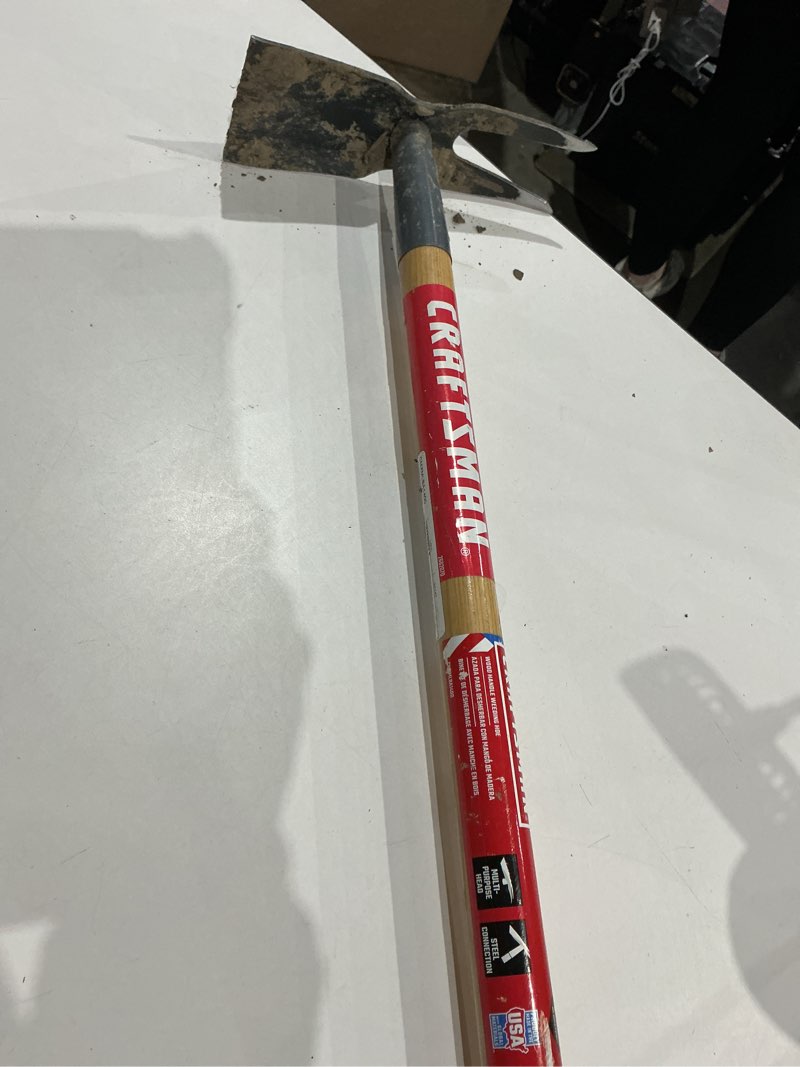 Condition photo showing As Is for tru tough 54-in wood -handle 2-prong hoe