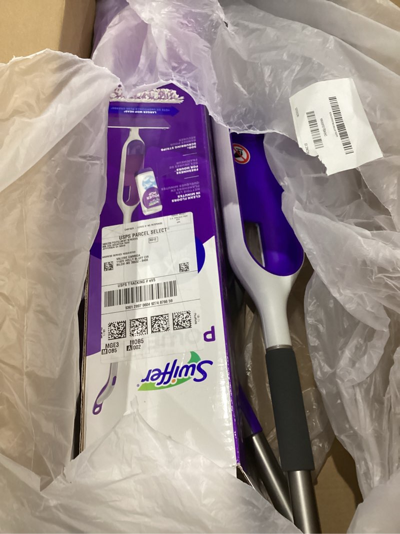 Condition photo showing As Is for Swiffer PowerMop Multi-Surface Mop Kit for Floor Cleaning, Includes PowerMop, 2 Mopping Pad Refills, 1 Cleaning Solution with Fresh Scent and 2 Batteries Purple and White