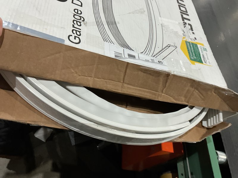 Condition photo showing As Is for duraseal garage door weather stripping kit, white 34 ft - side & top seal for 2” track - durable pvc, nails included - made in usa
