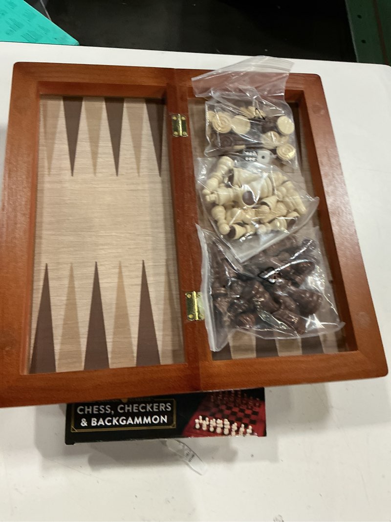Condition photo showing As Is for spin master games, cardinal classics, wood chess, checkers, and backgammon set, ages 8 and up