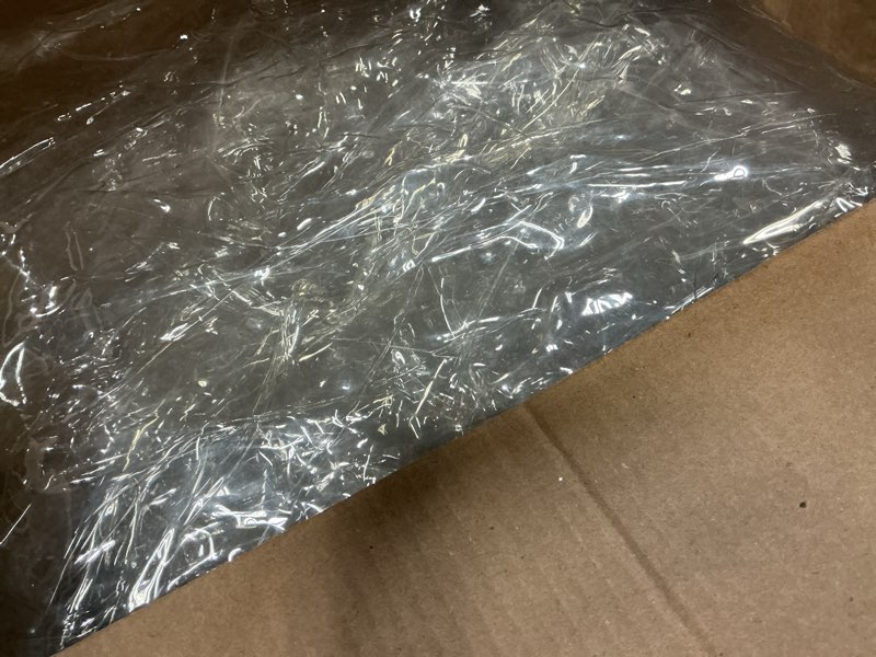 Condition photo showing As Is for 10' x 15' Clear Vinyl Tarp - Super Heavy Duty 20 Mil Transparent Waterproof PVC Tarpaulin with Brass Grommets - for Patio Enclosure, Camping, Outdoor Tent Cover, Porch Canopy - by Xpose Safety