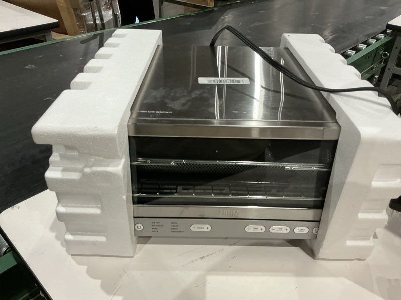 Condition photo showing Good Condition for ninja air fryer toaster oven combo | 8-in-1 functionality | flip up & away for storage space | air fry basket, sheet pan, wire rack & removable crumb tray |1800 watt | stainless steel | sp151 stainless premium 8-in-1 flip oven