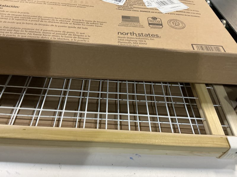 Condition photo showing As Is for toddleroo by north states - extra-wide wire mesh wooden baby gate: pressure mounted baby gate for doorways - adjustable 29.5 to 50 inches wide - 31 inches tall