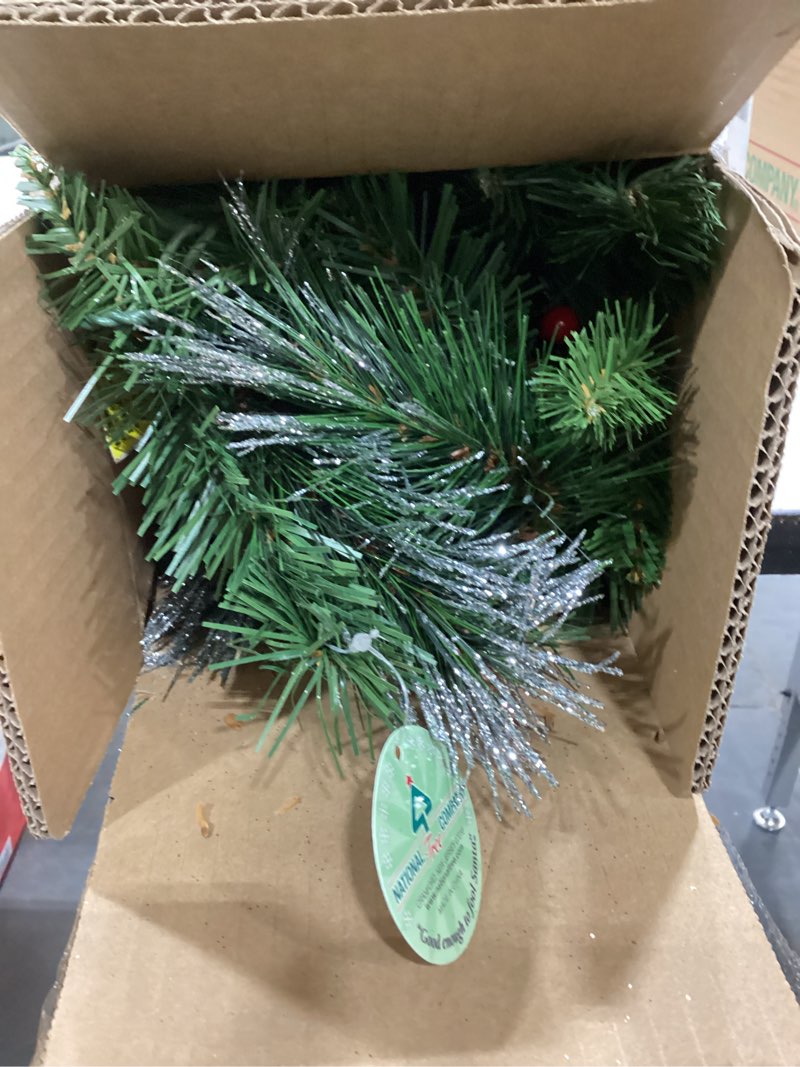 Condition photo showing Good Condition for national tree company 9 ft pre-lit crestwood spruce artificial christmas garland, christmas decoration with glitter, pinecones, red berries, 50 clear lights, 180 tips, green plug in tree