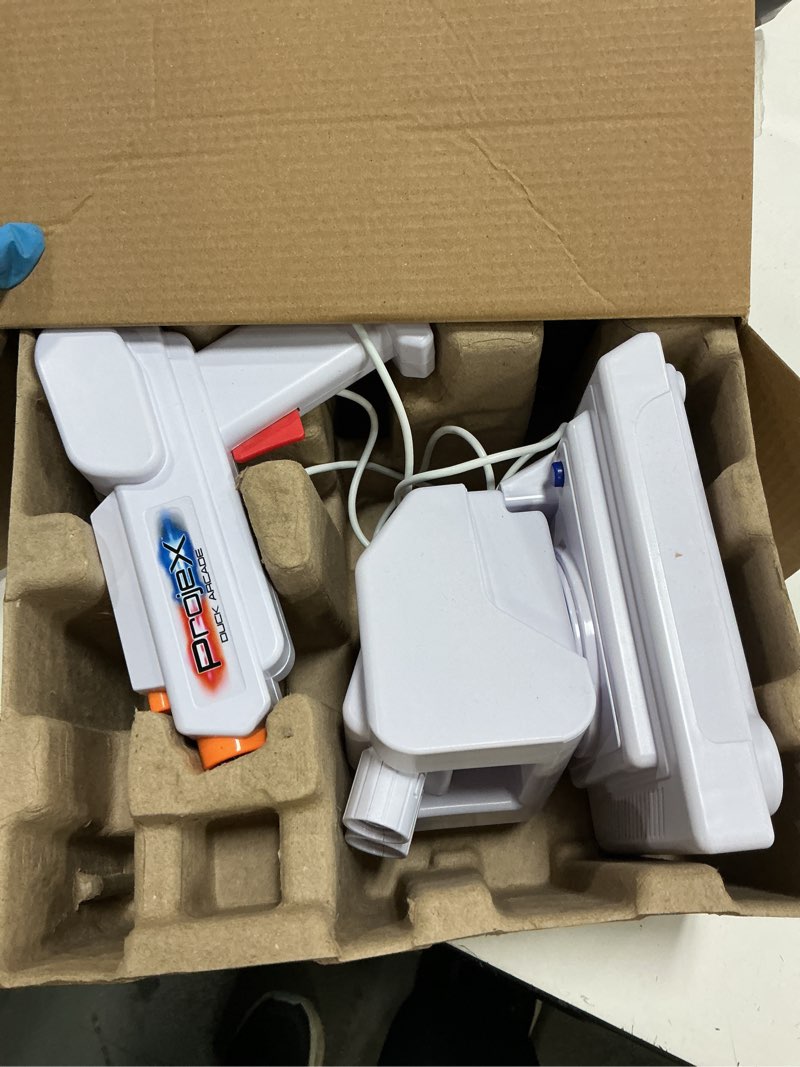 Condition photo showing As Is for projex duck arcade projecting moving target game, 3 built-in indoor games, children ages 6 and up