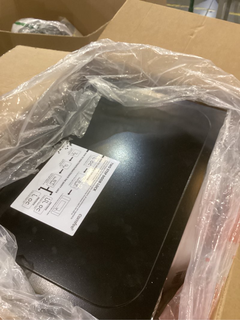 Condition photo showing As Is for COMFEE' EM720CPL-PMB Countertop Microwave Oven with Sound On/Off, ECO Mode and Easy One-Touch Buttons, 0.7cu.ft, 700W, Black 0.7 Cu.Ft Black