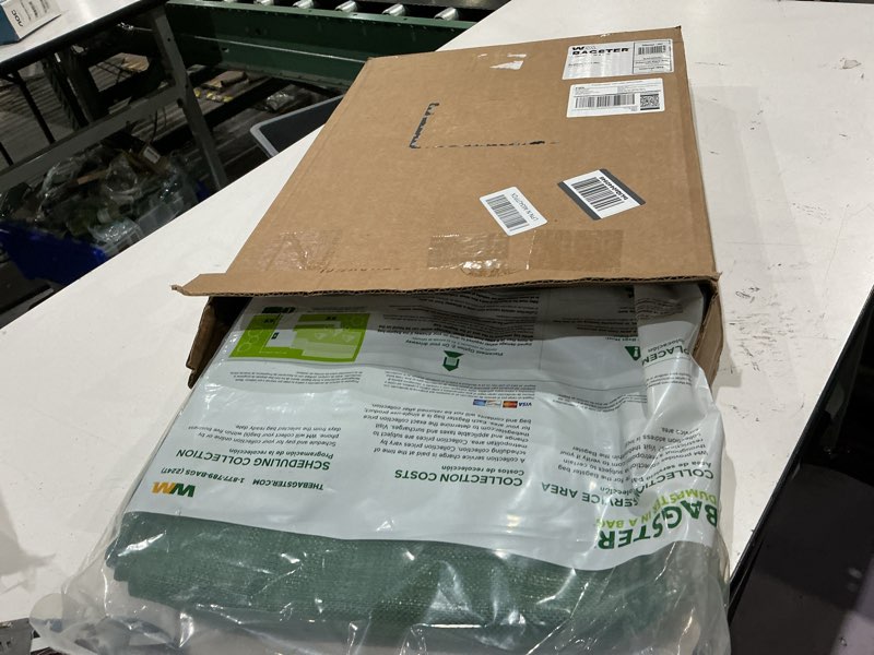 Condition photo showing New/Like New for bagster 3cuyd dumpster in a bag holds up to 3,300 lb, green