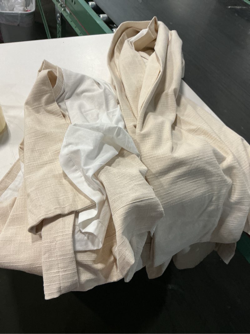 Condition photo showing As Is for piped edge cotton true blackout curtain (48x96)