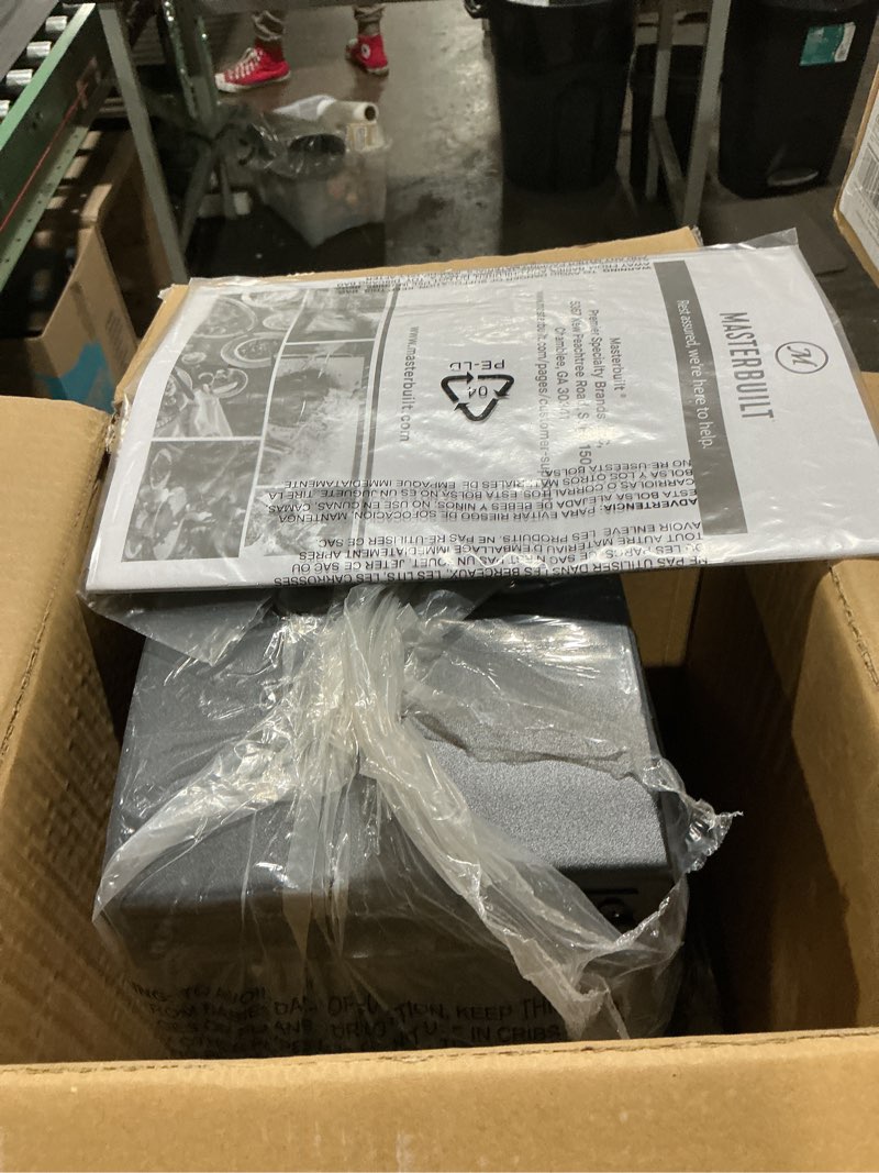 Condition photo showing As Is for masterbuilt® slow and cold smoker accessory attachment with removable ash tray for masterbuilt vertical bbq smokers in black, 10" x 10" x 18", model mb20100112 new version