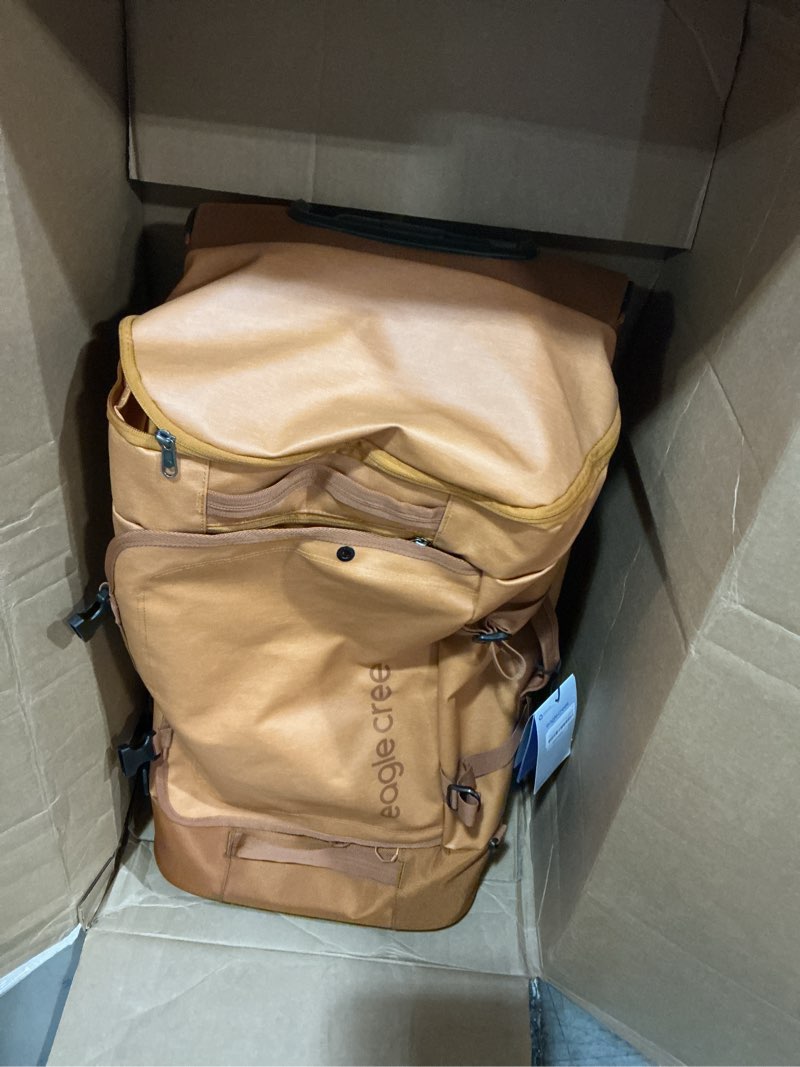 Condition photo showing New/Like New for Eagle Creek Cargo Hauler XT Wheeled Duffel - Wheeled Backpack Duffel - Deployable Backpack Straps - Lockable U-Lid & Easy Access Compartment - 29" - Iron Orange