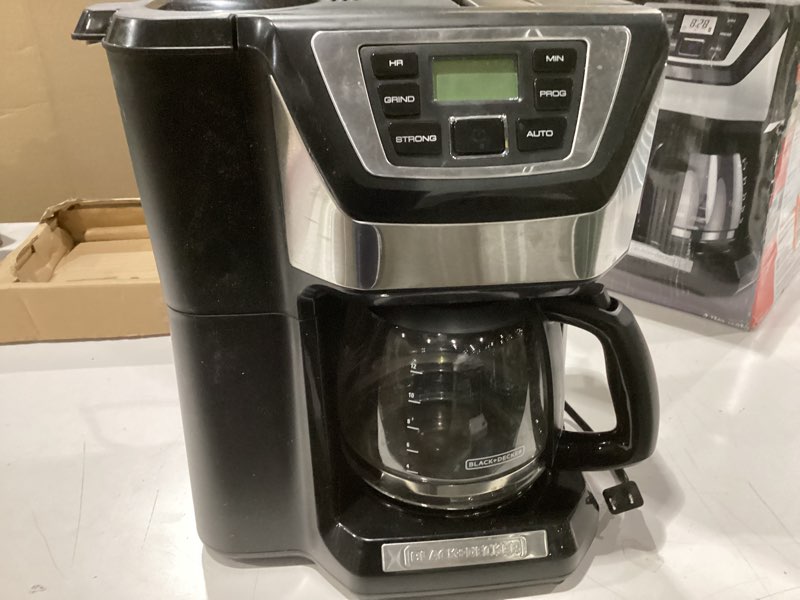 Condition photo showing Good Condition for Black and Decker BLACK+DECKER 12-Cup Mill and Brew Coffeemaker, Black, CM5000B 12-Cup Coffee System