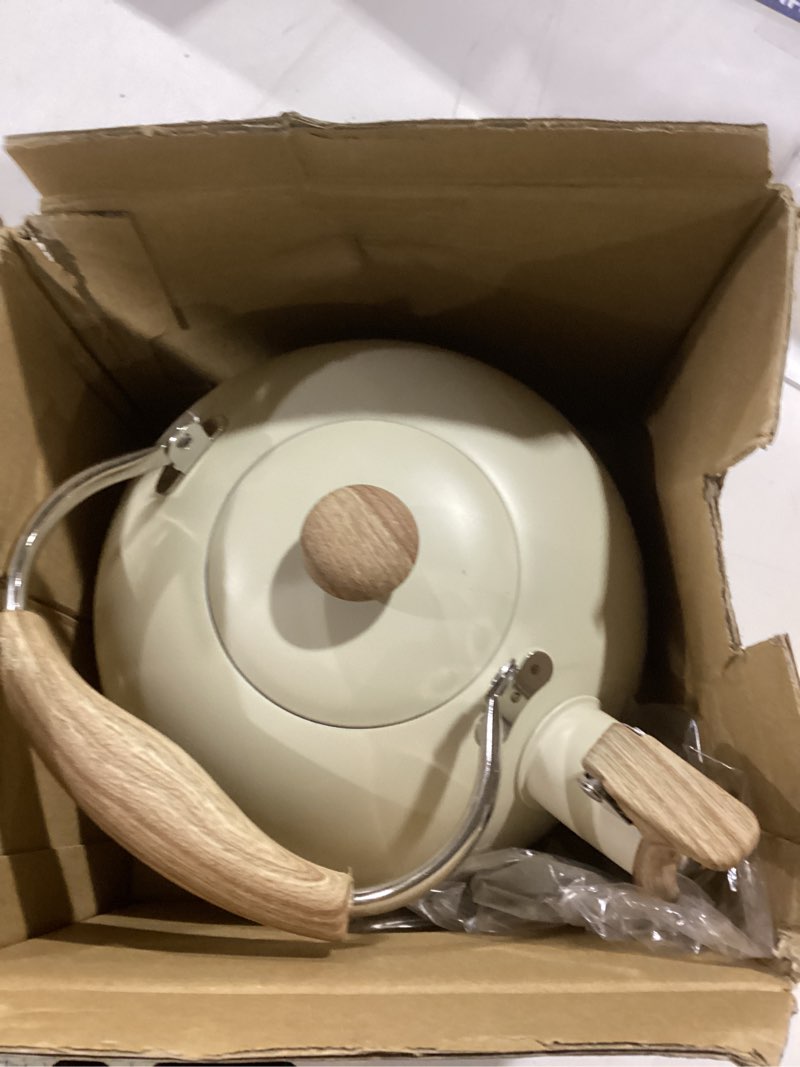 Condition photo showing Good Condition for stove top kettle, 2.5 quart whistling kettle for gas hob with wood pattern handle loud whistle food grade stainless steel, anti-hot handle and anti-rust, suitable for all heat sources white