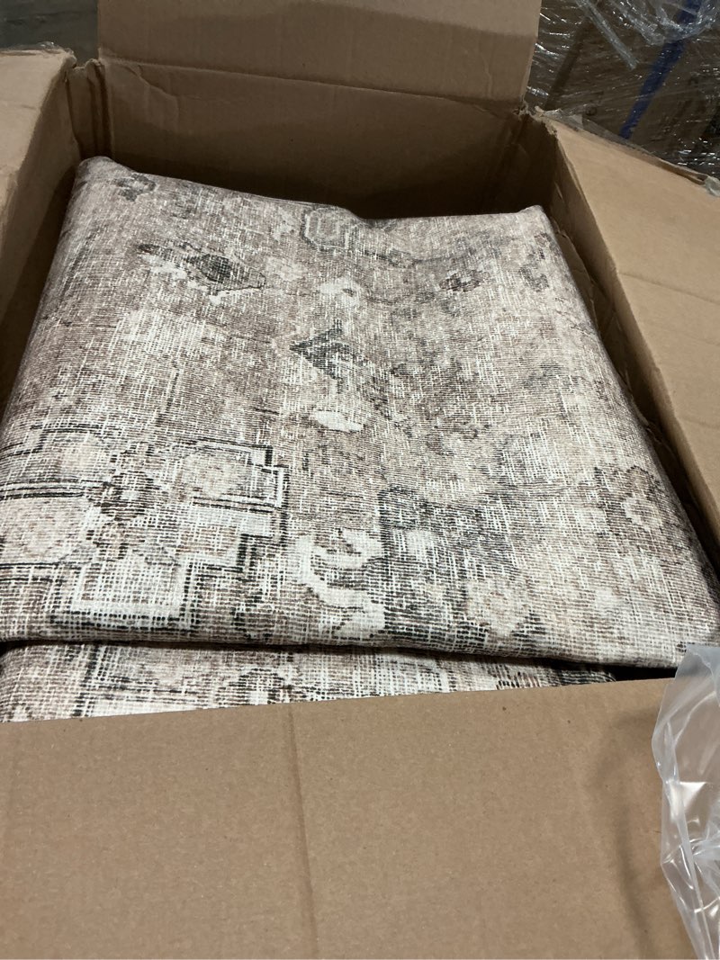 Condition photo showing Good Condition for nuloom 6' x 9' machine washable area rug with waterproof spill proof surface, non slip backing and stain resistant for living room, bedroom, kitchen, dining room, davi taupe davi stone 6' x 9' (rectangular)