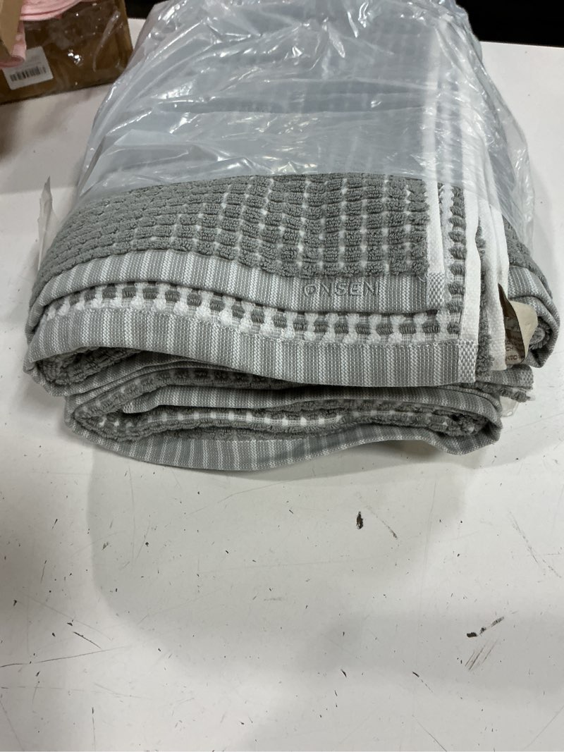 Condition photo showing Good Condition for onsen sculpted terry bath towels, 100% american cotton, quick dry lint free, lightweight absorbent bath towel set with hanging loop, 28x55 in (grey fog, 2x bath towel) grey fog 2x bath towel