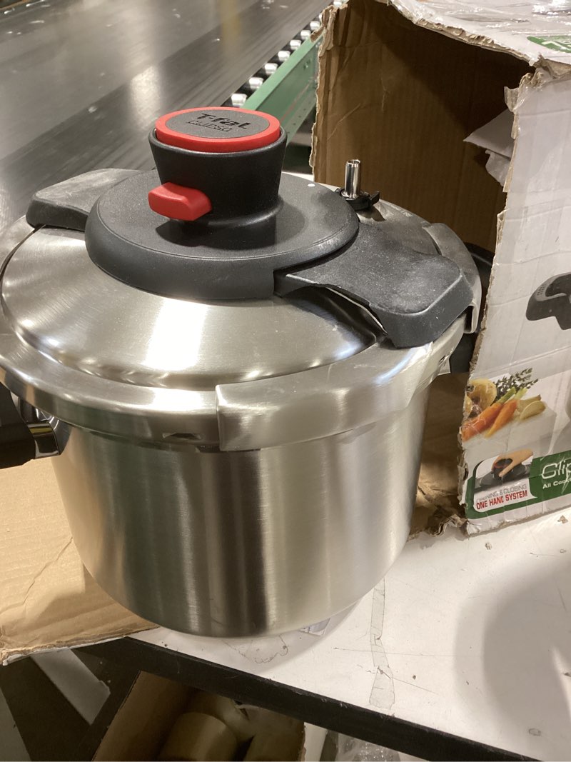 Condition photo showing As Is for T-fal Clipso Stainless Steel Pressure Cooker, 6.3 Quart, Induction Cookware, Secure Locking System, One Hand System, Recipe Book Included, Pots and Pans, Kitchen, Silver Easy Open Pressure Cooker 6.3 Quarts