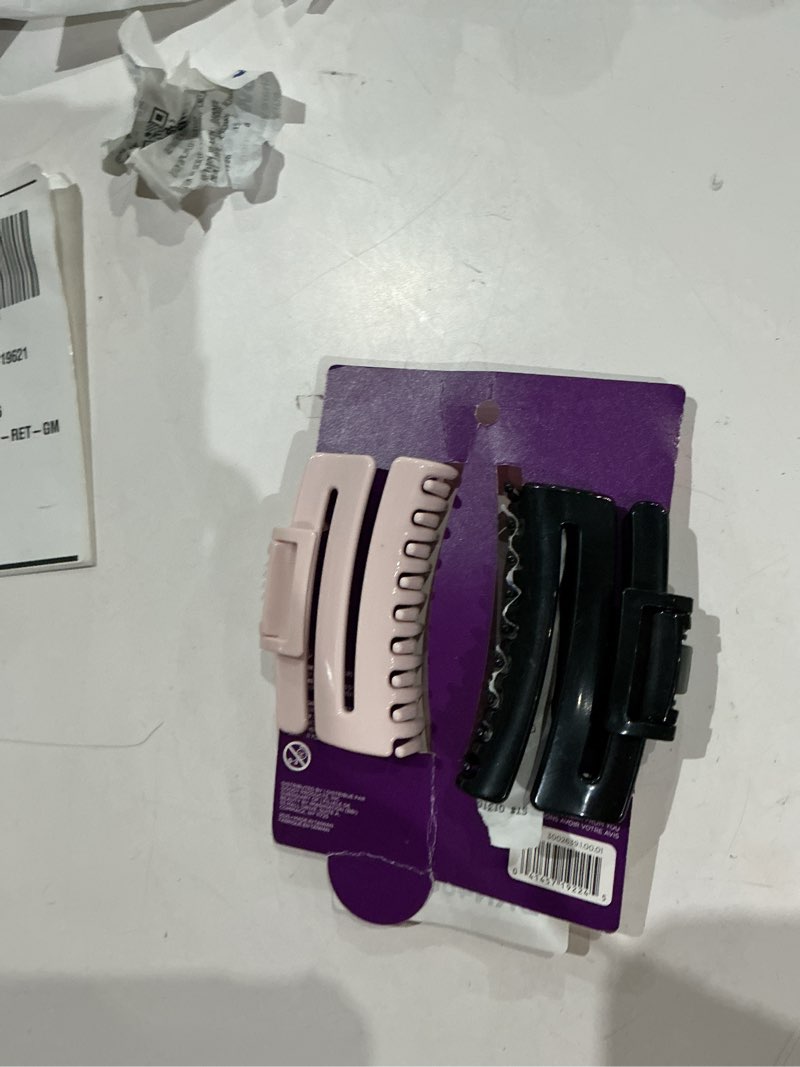Condition photo showing New/Like New for goody comfortflex flexible claw clips - black & pink