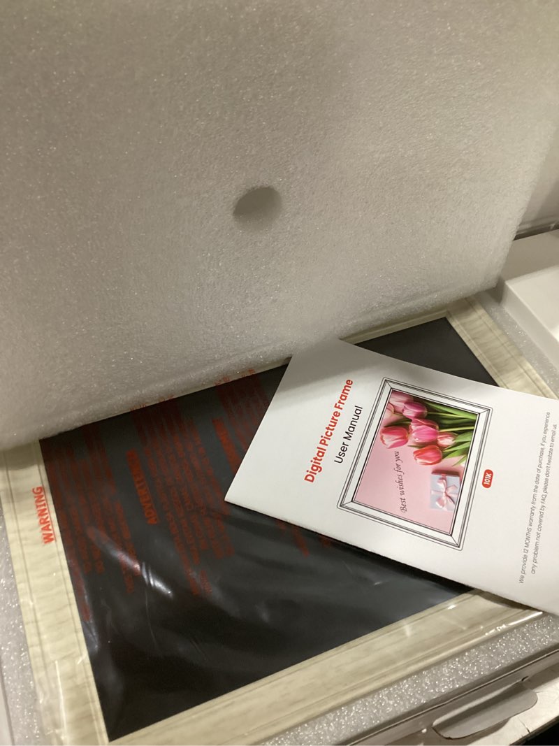 Condition photo showing Good Condition for frameo 10.1 inch wifi digital picture frame, 1280x800 hd ips touch screen photo frame electronic, 32gb storage, auto-rotate, wall mounted, share photos/videos instantly from anywhere - white 10.1 inch white wood