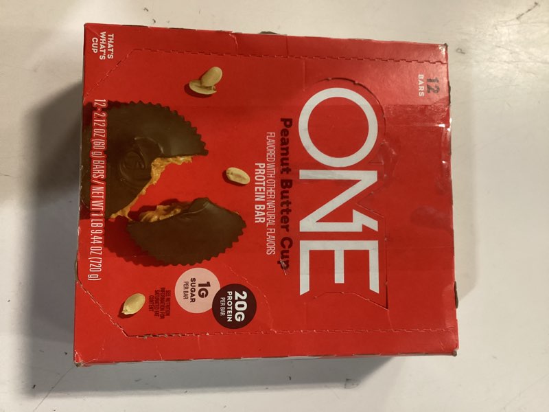 Condition photo showing New/Like New for one protein bars, peanut butter cup, gluten free with 20g protein and 1g sugar, pantry staples, 2.12 oz (12 count) 2.12 ounce (pack of 12) peanut butter cup