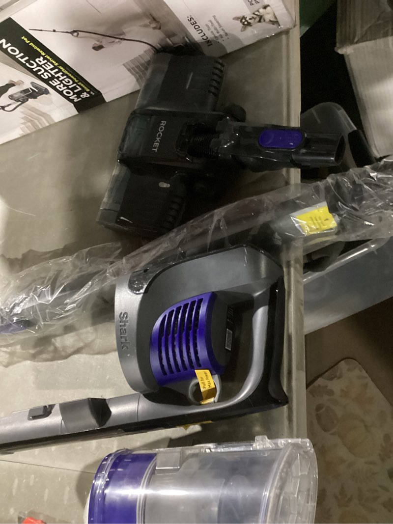 Condition photo showing As Is for shark | pet cordless vacuum cleaner | led headlights | removable handheld vacuum for pet hair | crevice tool & pet multi-tool included | 40min runtime | for carpet & hard floors | grey | ix141 pet cordless essential