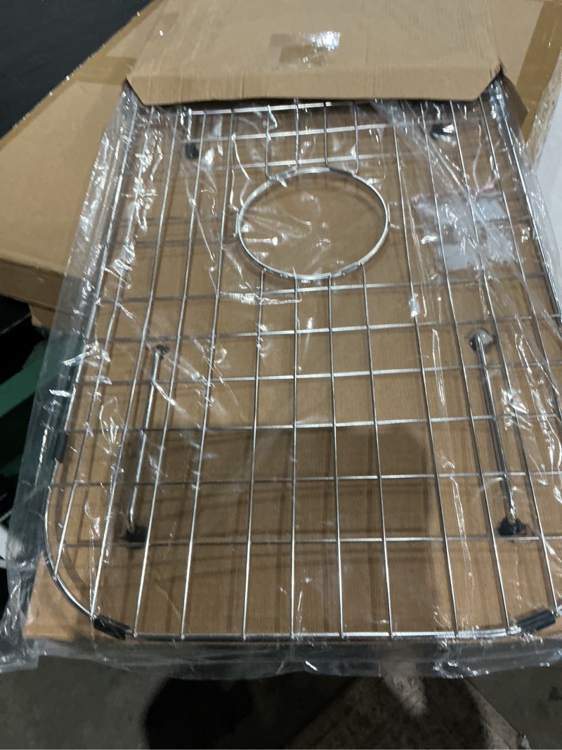 Condition photo showing Good Condition for sink protector grid 26-1/16" x 14-1/16",centered drain with corner radius 3-1/2", stainless steel material(centered drain)