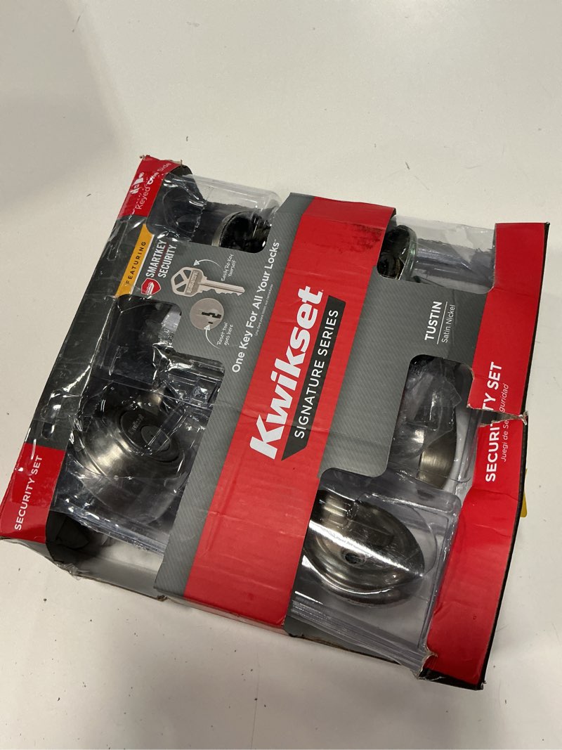 Condition photo showing As Is for kwikset smartkey tustin satin nickel deadbolt and entry door knob kw1 1-3/4 in.