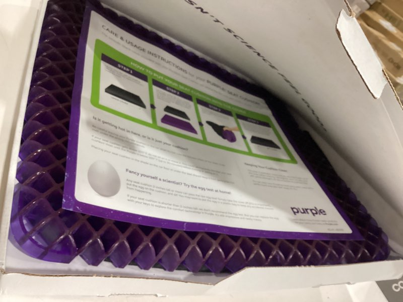Condition photo showing New/Like New for purple simply seat cushion | pressure reducing grid designed for ultimate comfort | designed for cars and travel | made in the usa